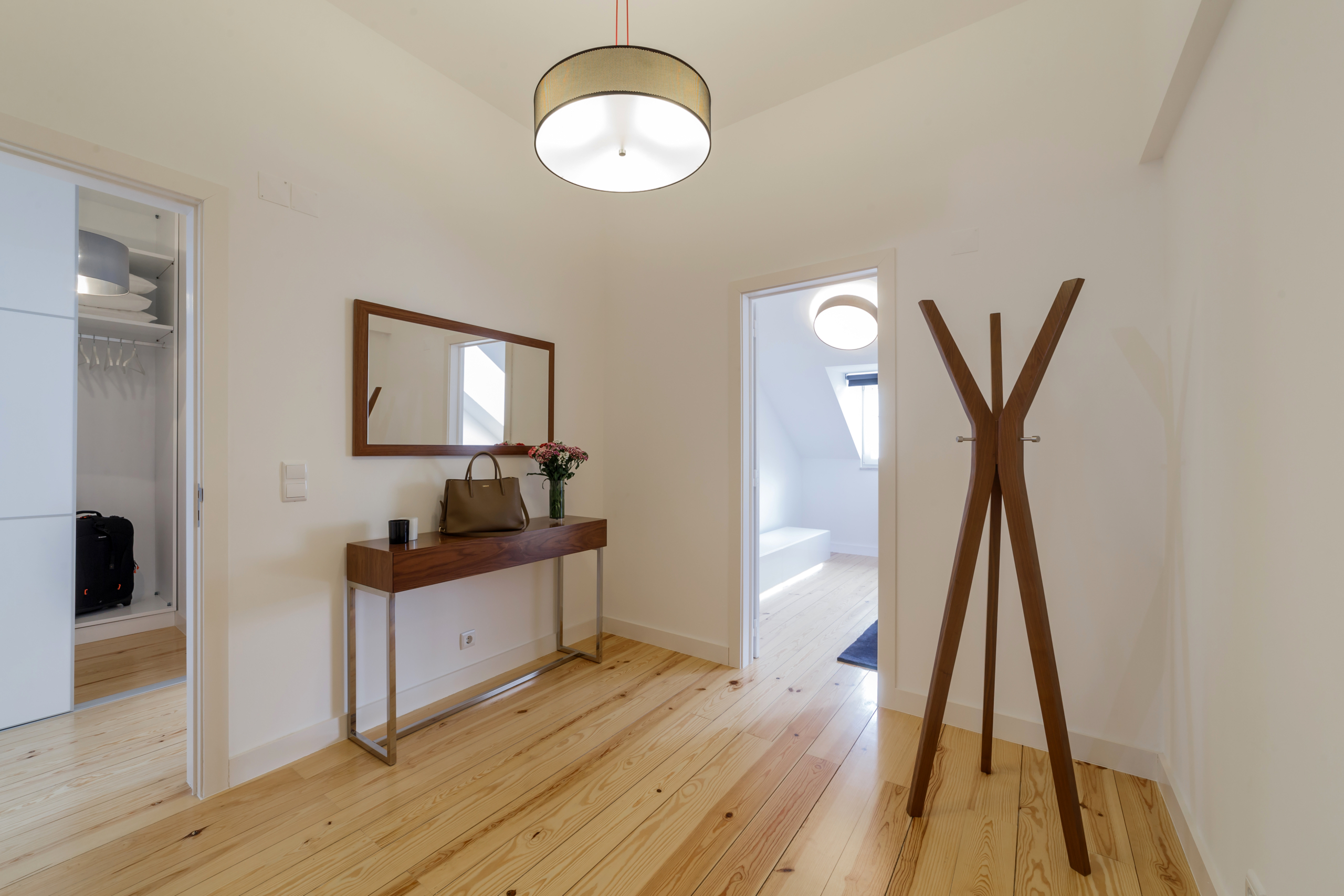 modern apartment with white walls and light wooden floor modern apartment with white walls and light wooden floor